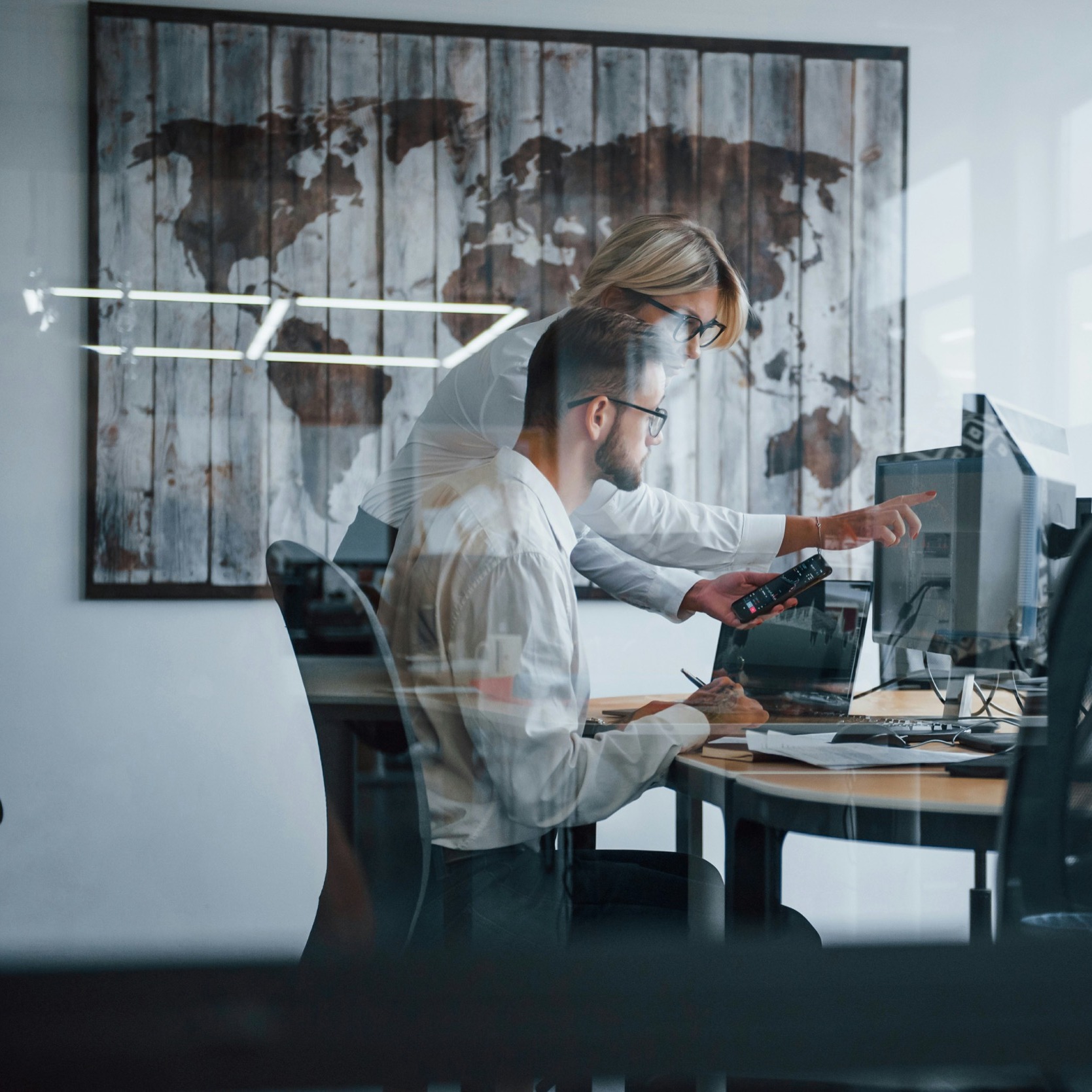 an employee is under instruction with his boss